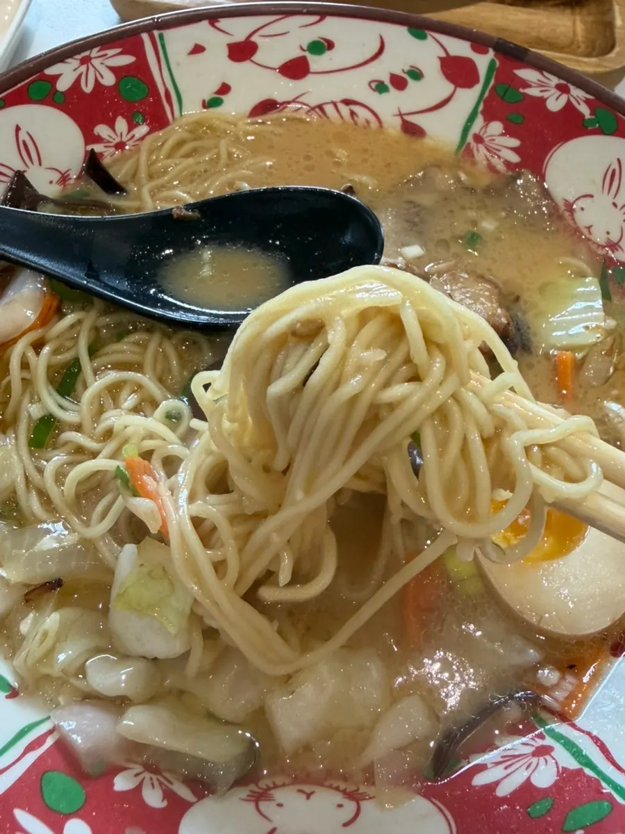 Close-up of miso ramen broth and char siu meat