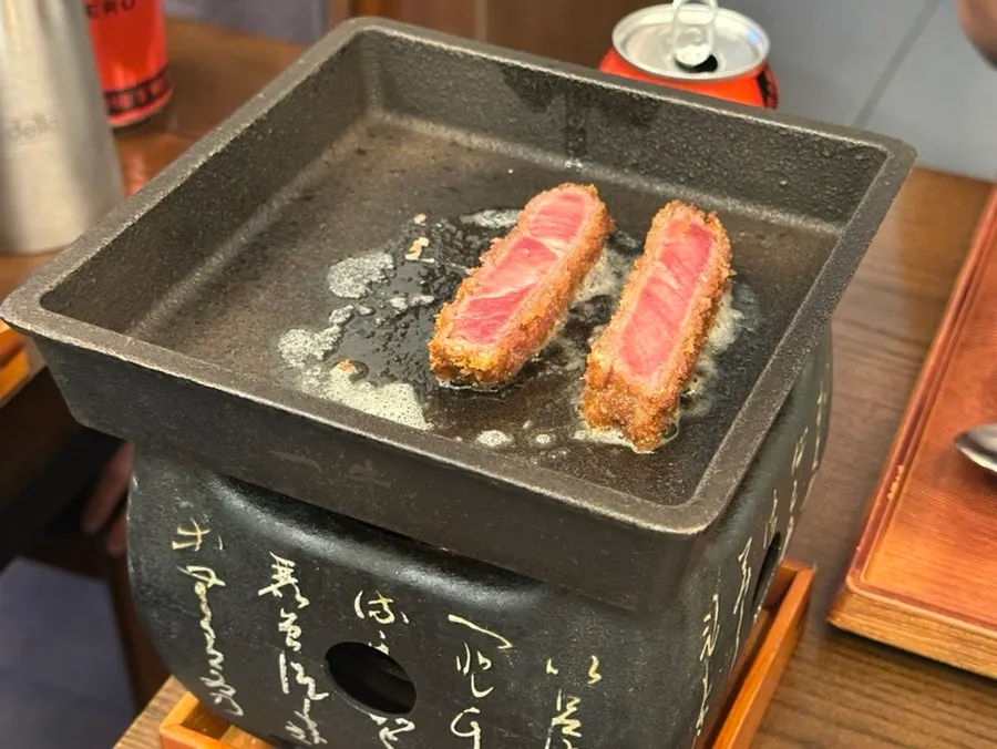 Isigny butter melting on the tabletop grill
