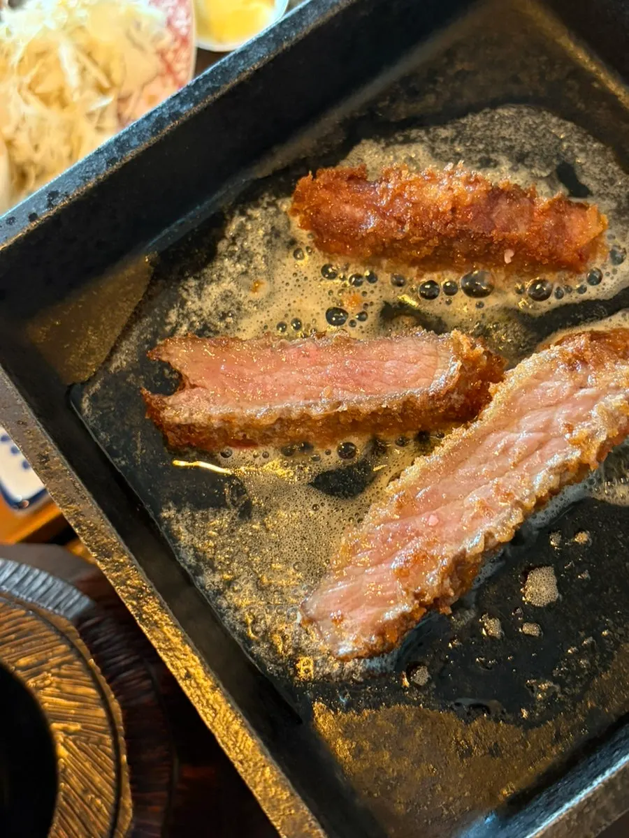 Sirloin gyukatsu grilled with melted butter on the tabletop grill