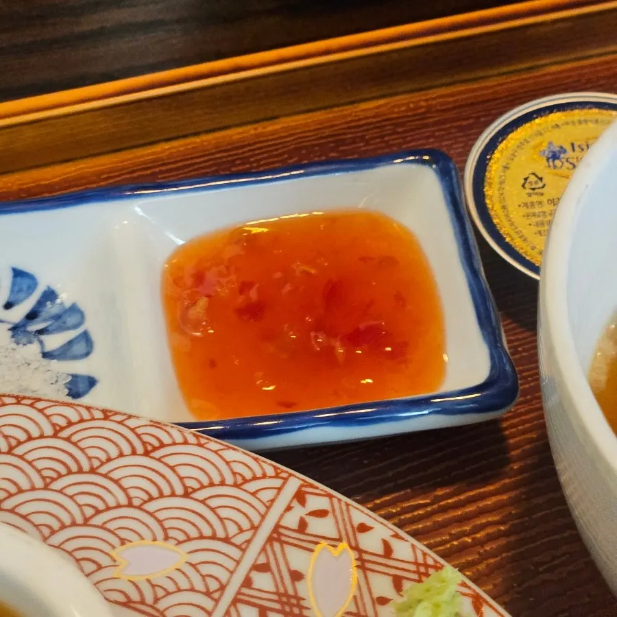 Three sauces: salt, chili sauce, and wasabi