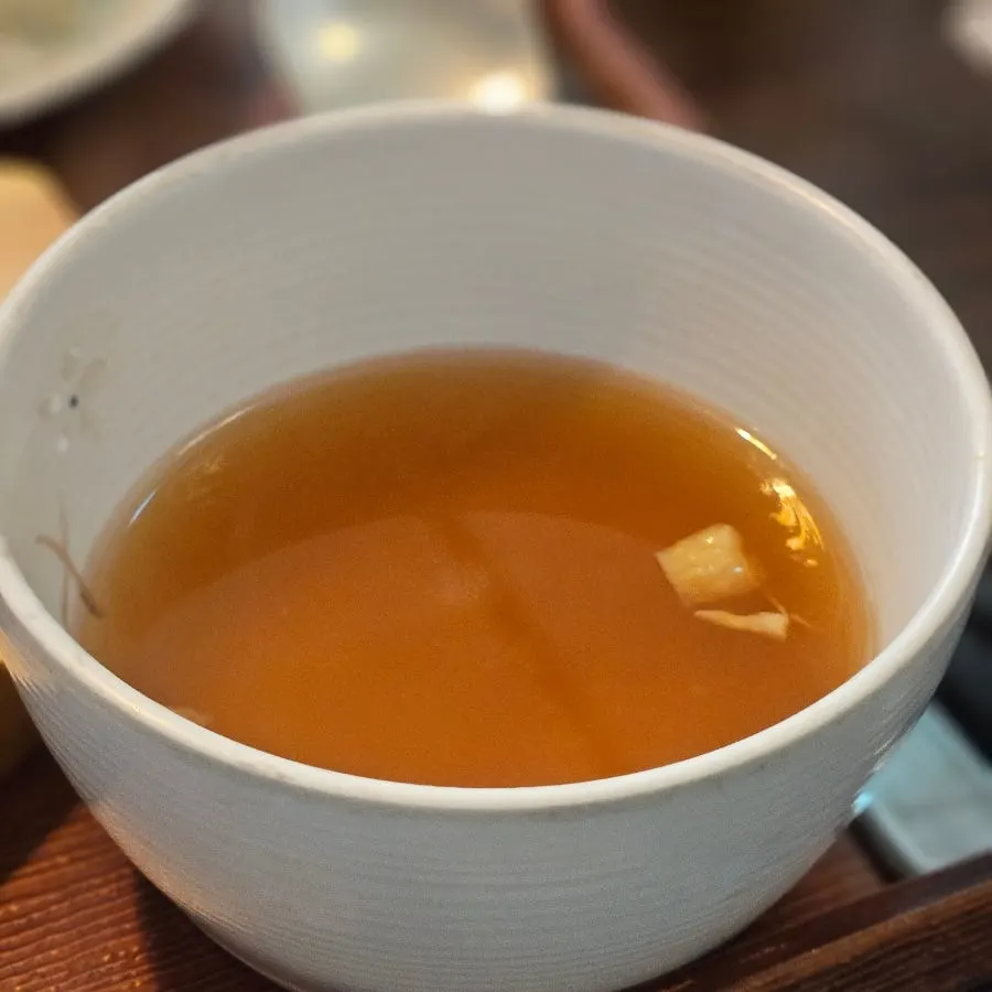 Clear soup served as part of the set