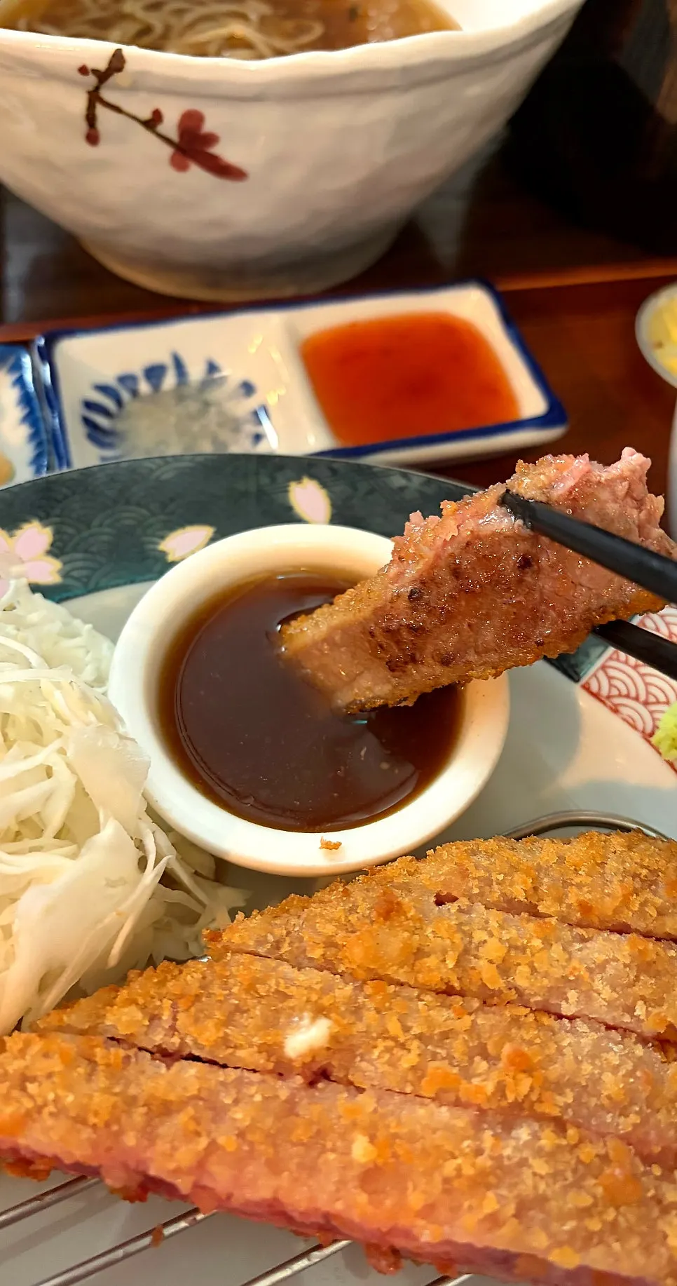 Golden-brown grilled gyukatsu with brown sauce