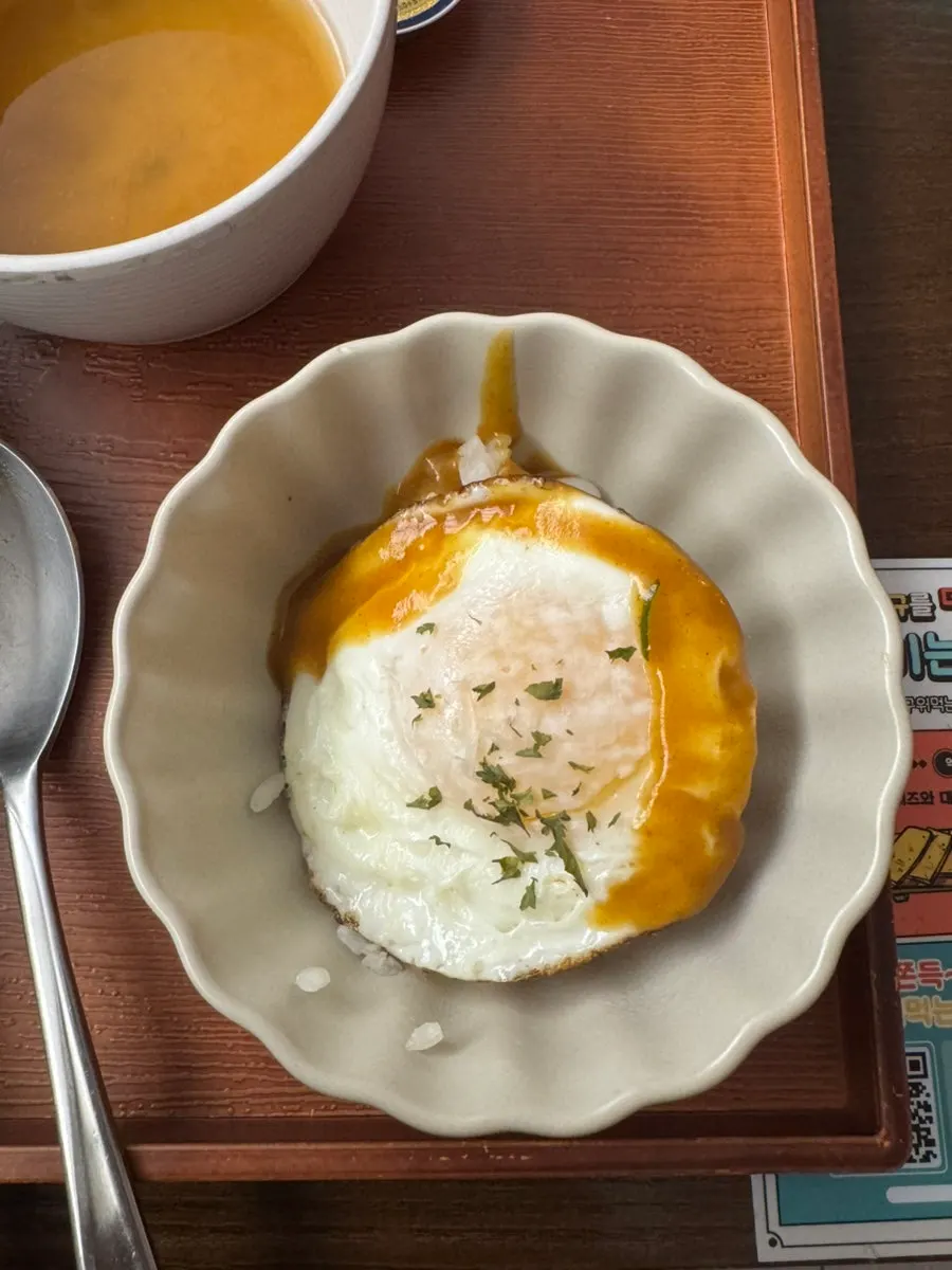 An extra fried egg that was ordered