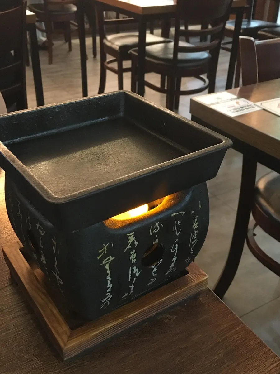 Gyukatsu brazier lit on the table