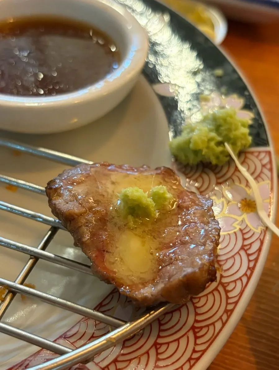 A piece of steki topped with Isigny butter