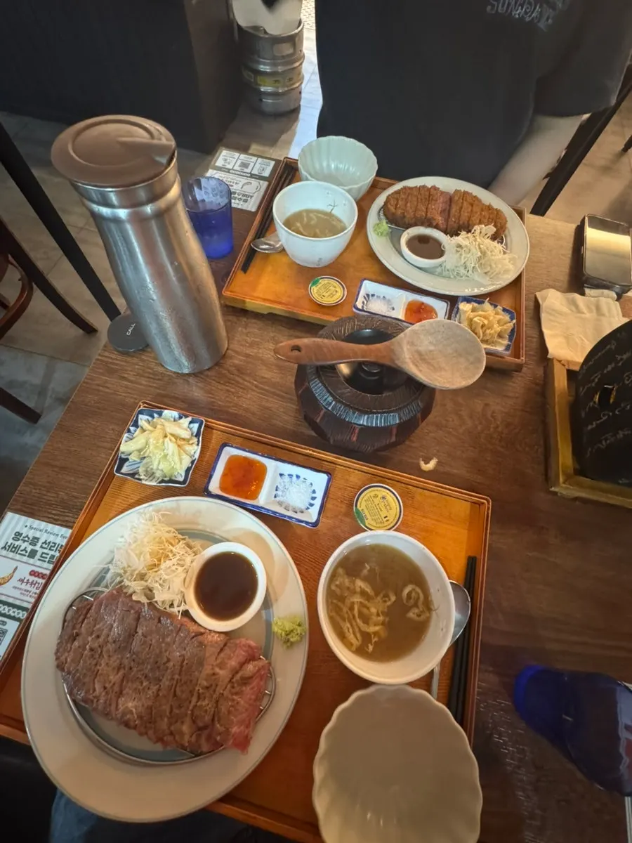 Full table spread of gyukatsu and steki jeongsik