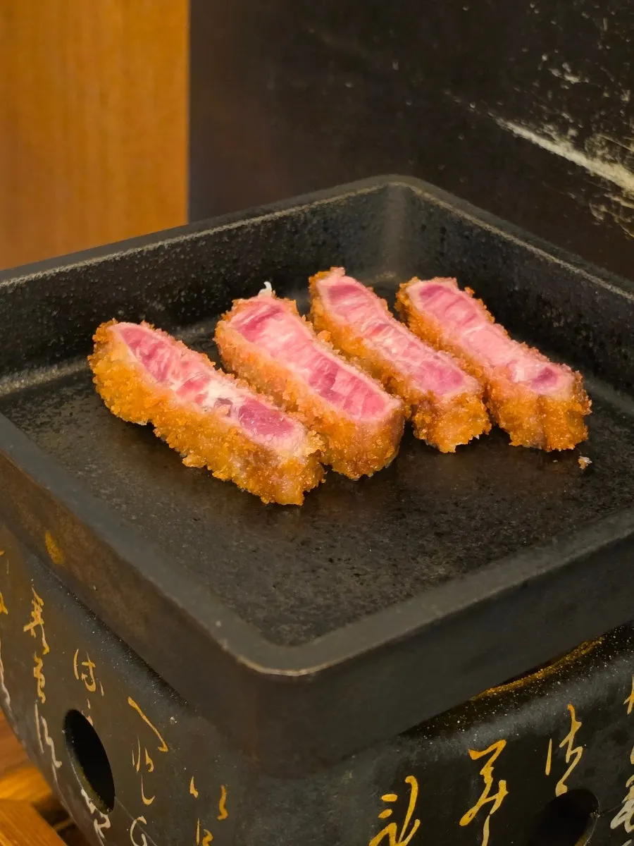 Cross-section of gyukatsu showing pink sirloin