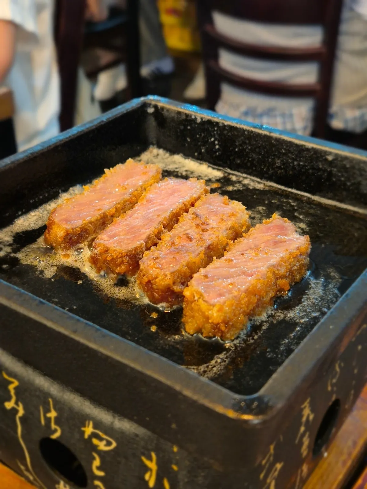 Cross-section of grilled Ichigyu gyukatsu showing marbling