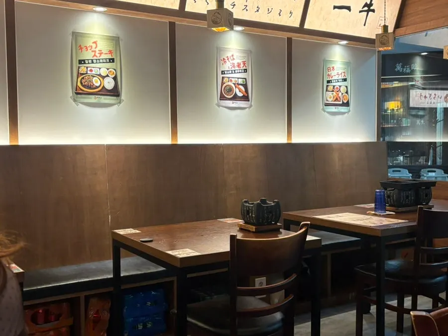 Neatly arranged seating for two and four at the restaurant