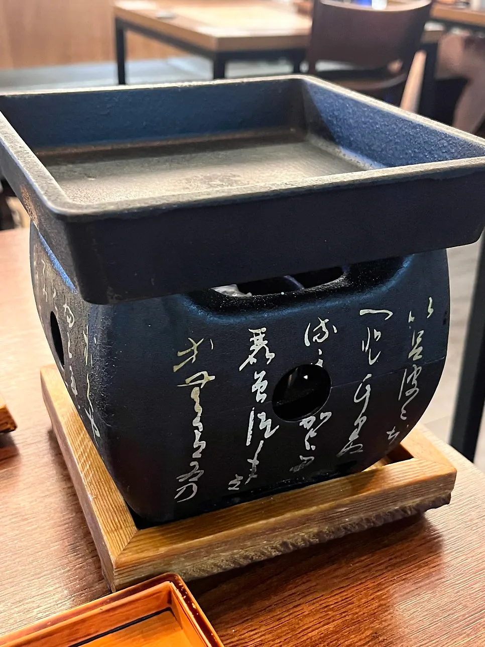 A piece of sirloin gyukatsu on the brazier
