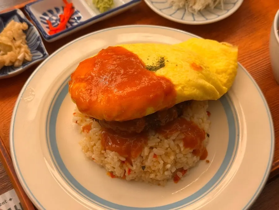 Gyukatsu and hamburg omurice shared between two diners