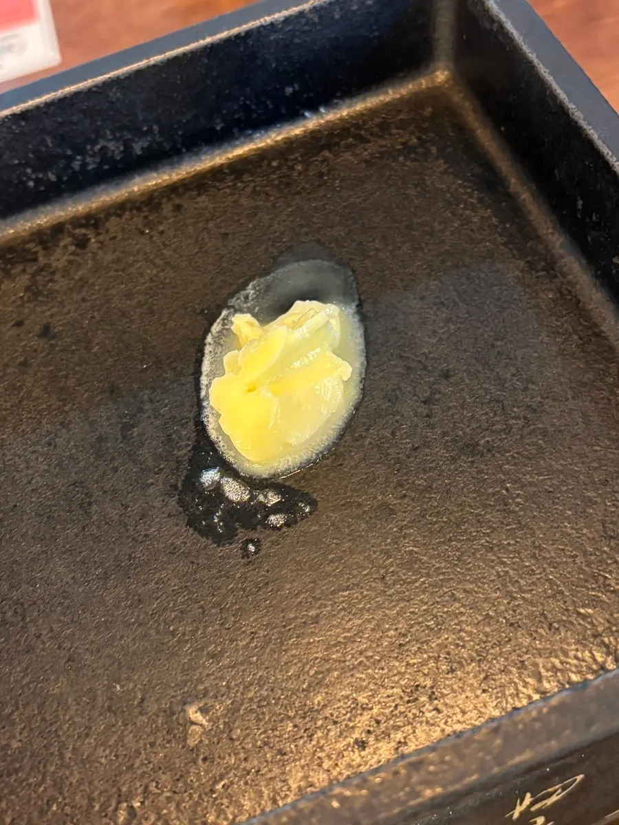 Isigny salted butter placed on the brazier
