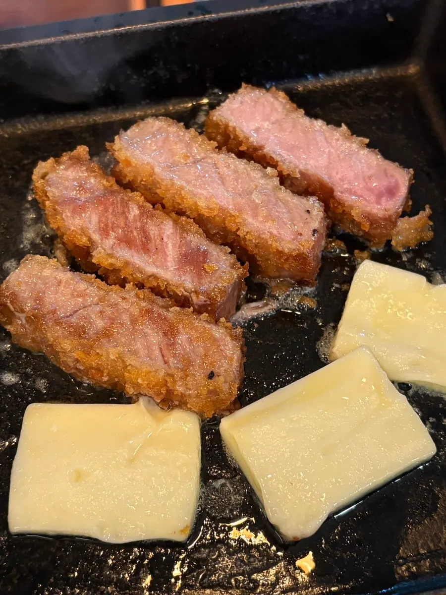Steki meat sizzling on the grill