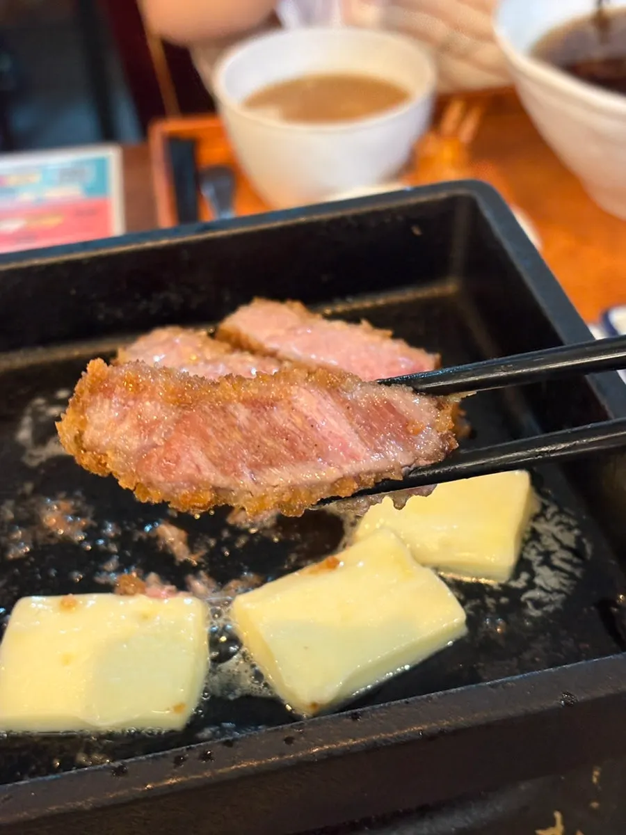 Grilling just as much meat as we could eat on the personal brazier