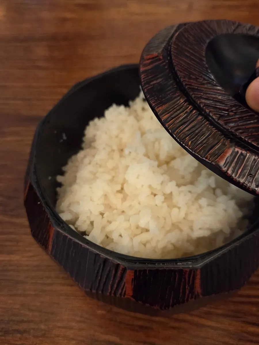A whole pot of rice served at the table