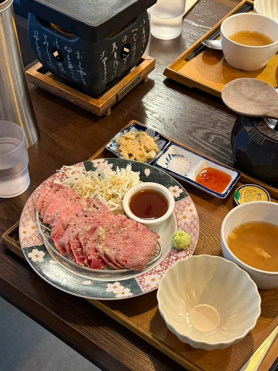 A piece of gyukatsu with salt and wasabi