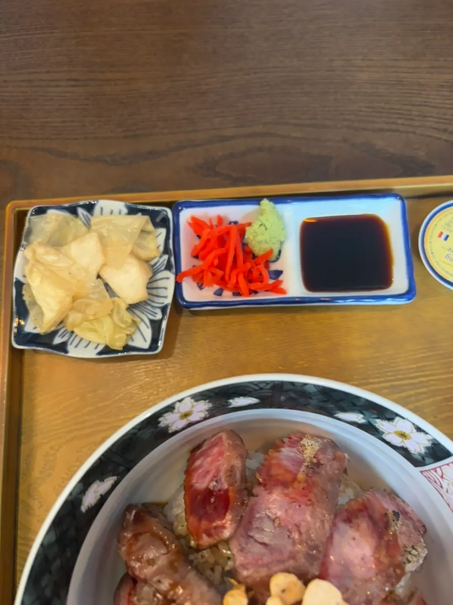 Three menus laid out for a lunch for three