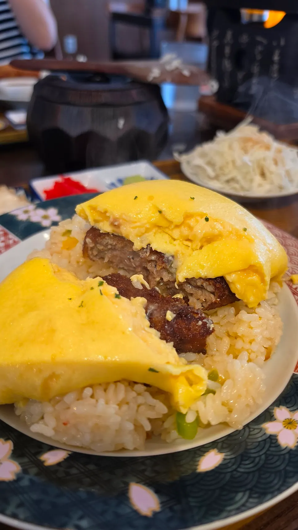 Omurice served with tomato-based sauce