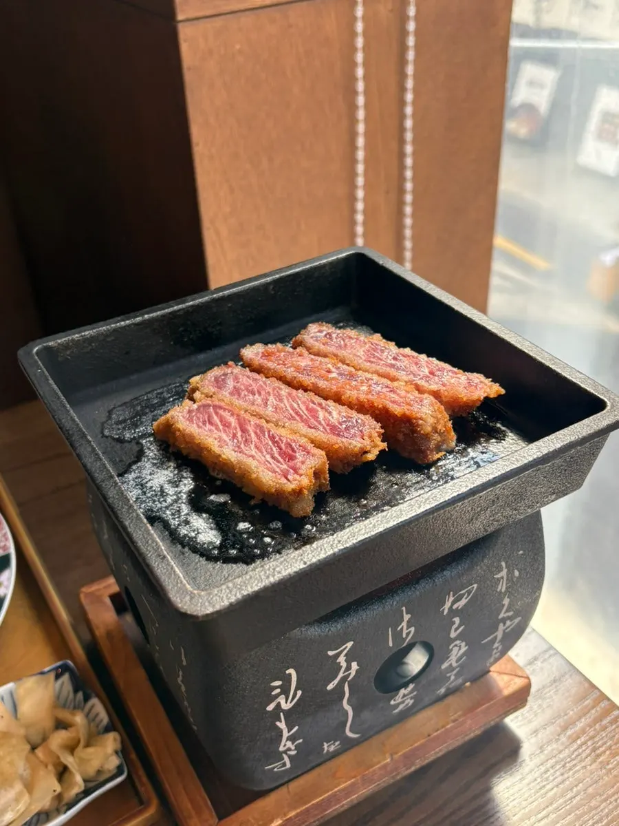 Gyukatsu dipped in sauce