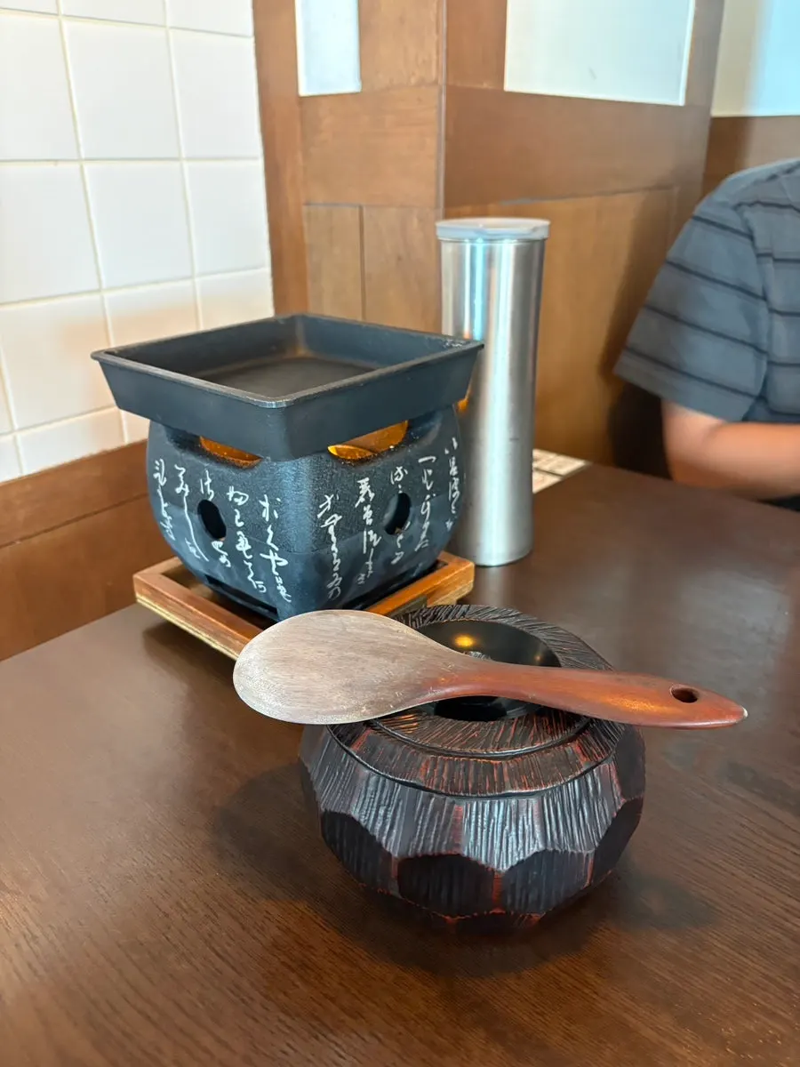 Lit mini brazier on the table