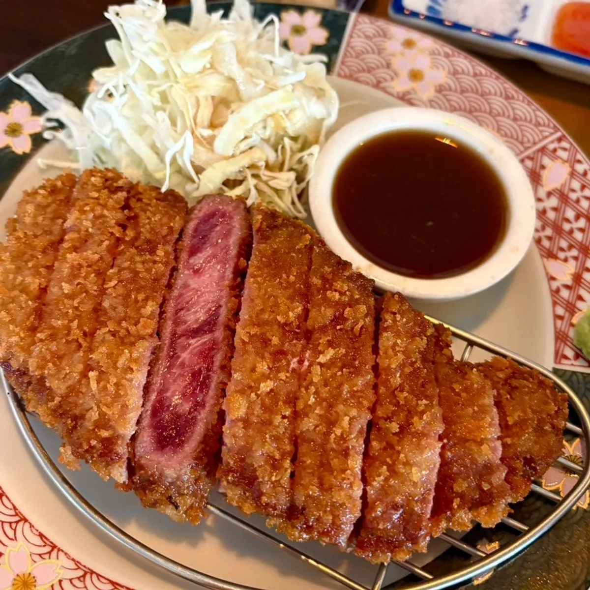 Cross-section of Ichigyu's gyukatsu, crispy outside and juicy inside