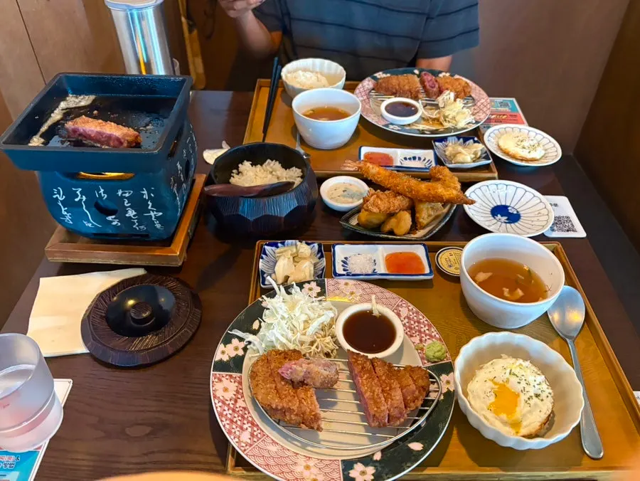 Full table spread of gyukatsu and sides for a lunch for two