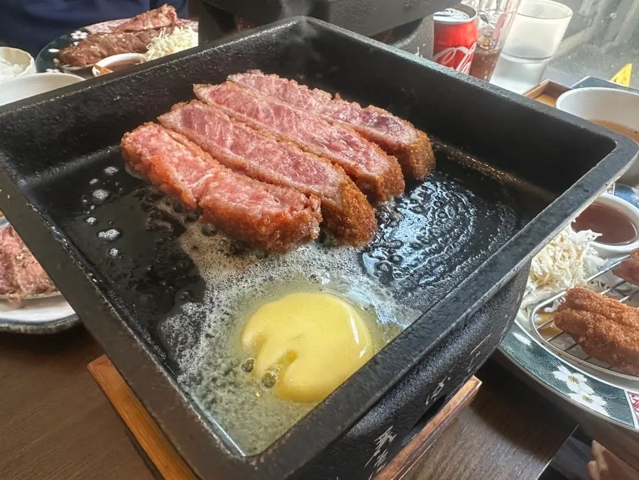 Cross-section of gyukatsu paired with itame sauce