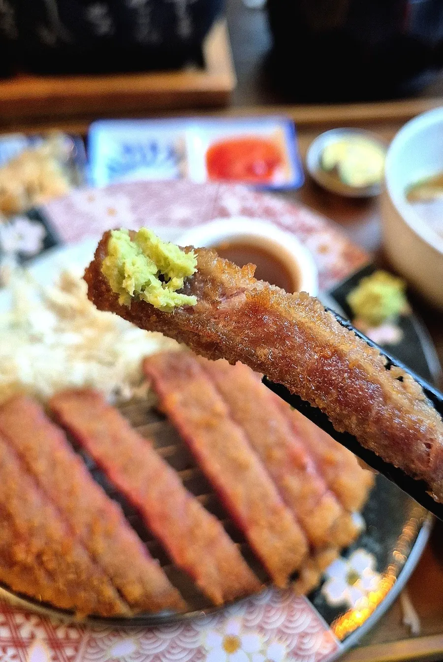 A piece of gyukatsu paired with rice