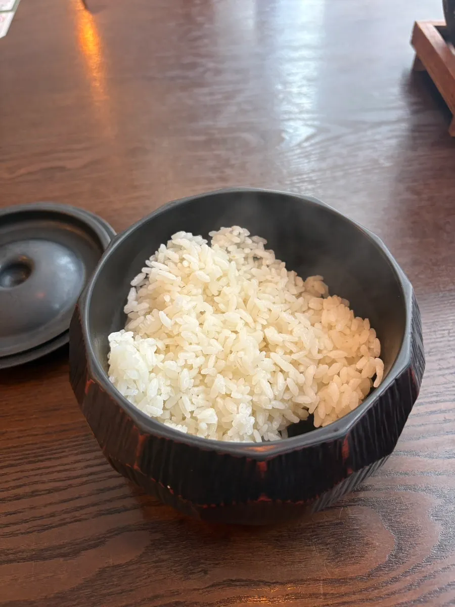 Rice bowl and paddle served first