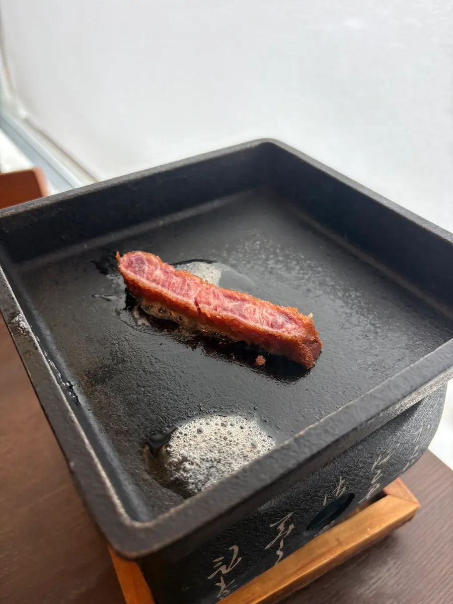 Butter melting on the cast-iron plate