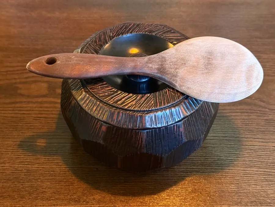 Bowl of white rice served before the main dish