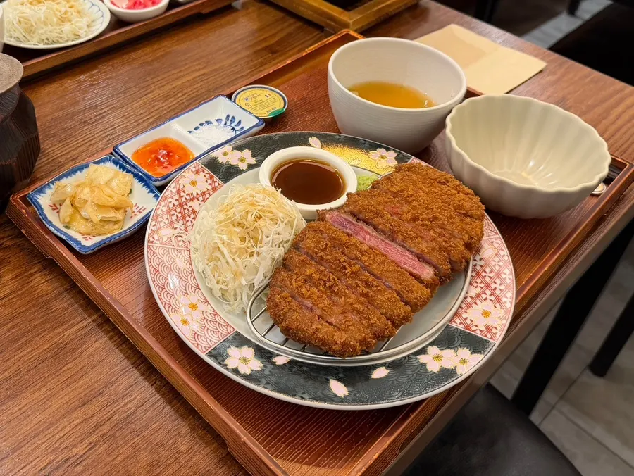 Full spread of gyukatsu with accompanying sauces