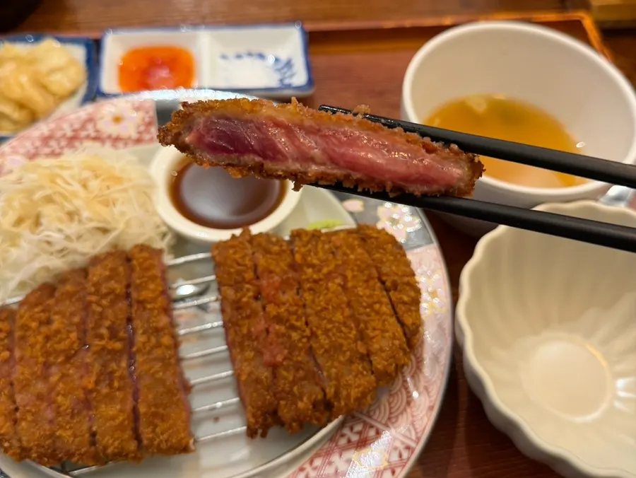 Cross-section of rare sirloin gyukatsu showing the moist interior