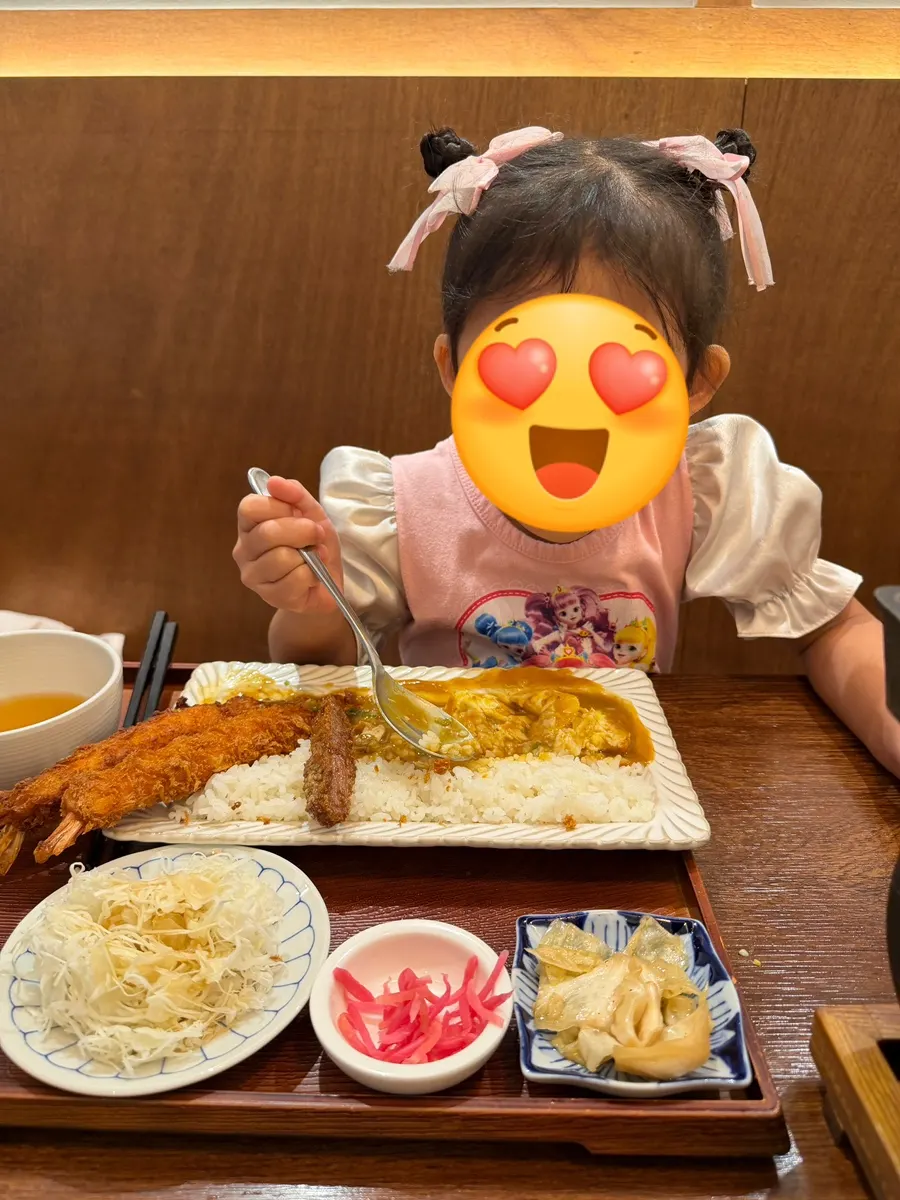 A plate of Japanese-style curry piled high with toppings