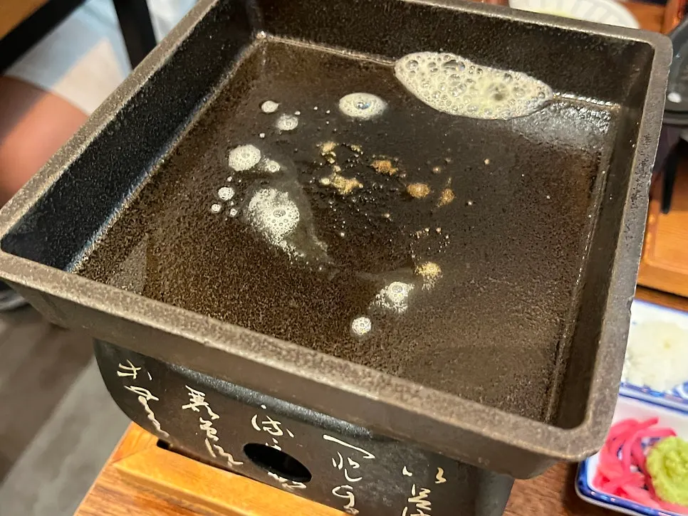 Isigny butter on the cast-iron plate with gyukatsu
