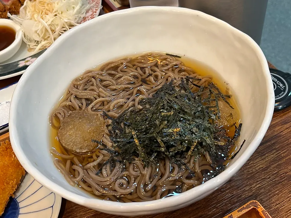 Cold soba served with wasabi, radish, and green onion on the side