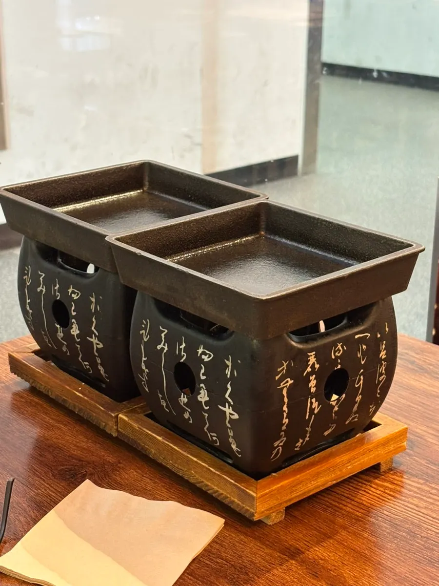 A table at Ichigyu Wonju with many family customers nearby