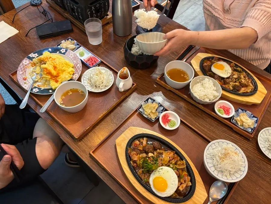 A separate bowl of fluffy steamed rice