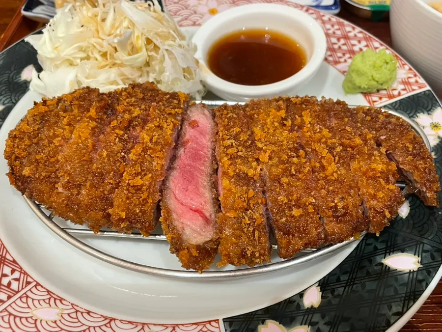 Full gyukatsu spread with cabbage salad and miso soup