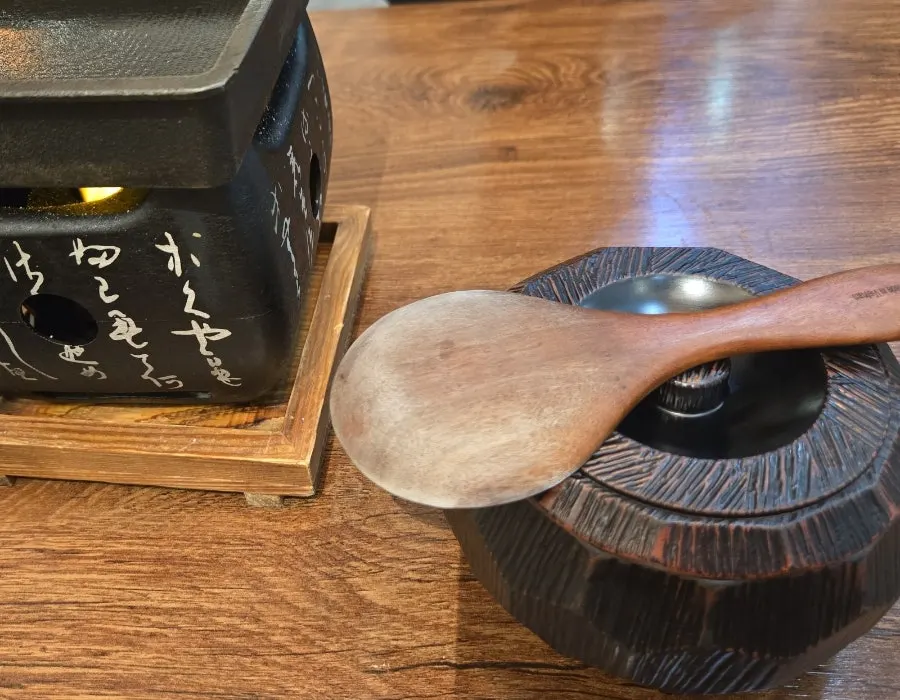 A piece of gyukatsu on the personal grill
