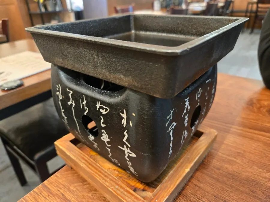Personal grill placed at every table