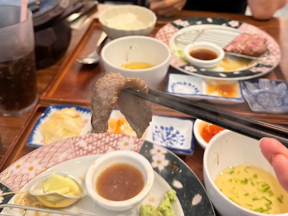 Table spread with gyukatsu and steki served together