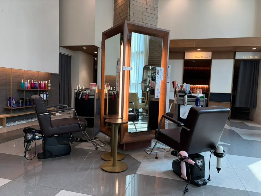 Spacious, clean waiting area of the hair salon