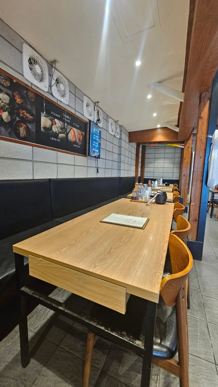 View of tables and seating at Ido Hoetjip
