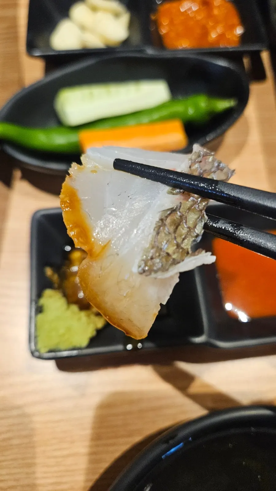 Plate of thickly sliced flounder sashimi
