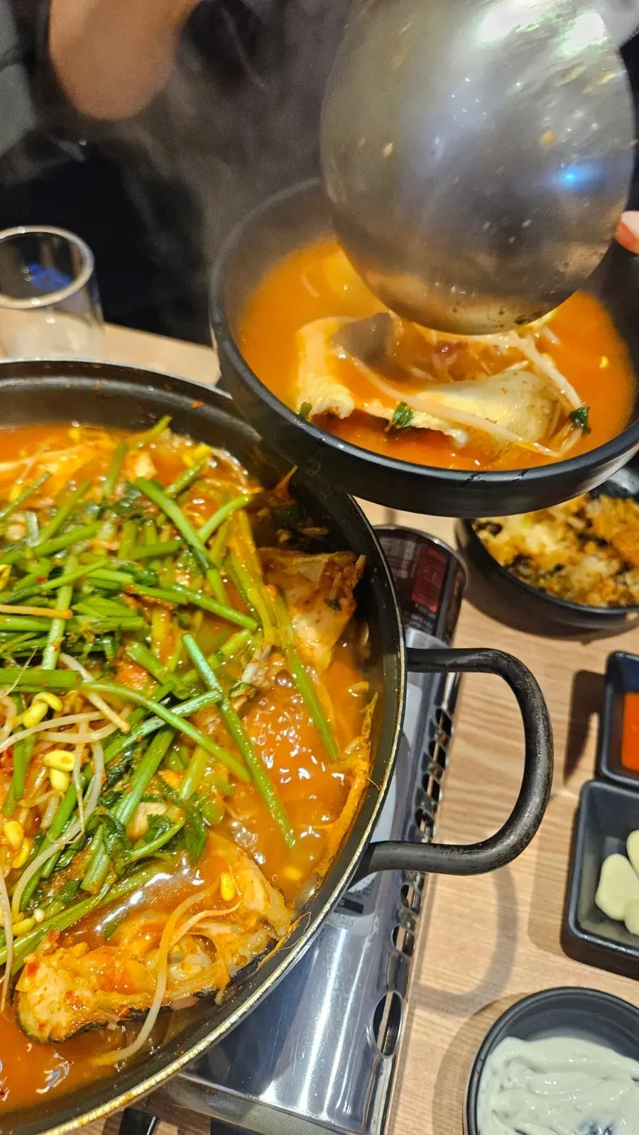 Thick chunks of fish in the spicy stew