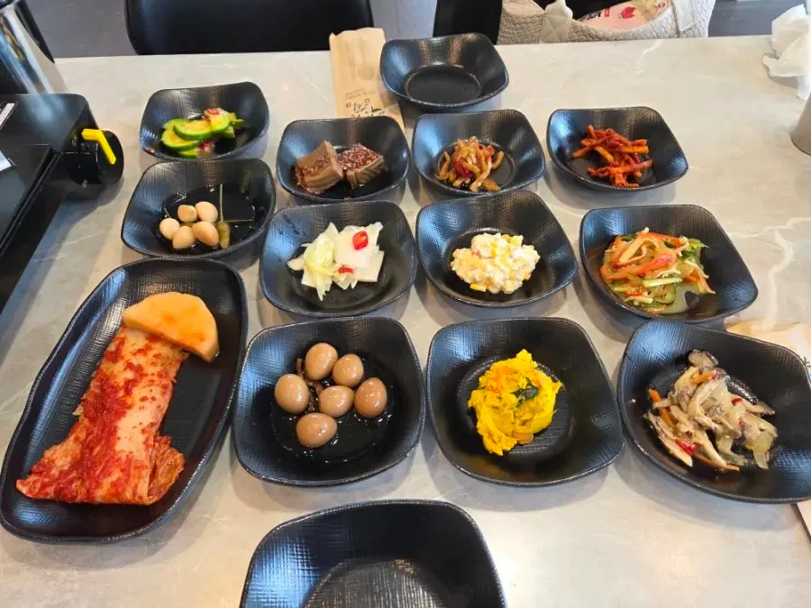 Galbijjim table setting with side dishes at Idobonga