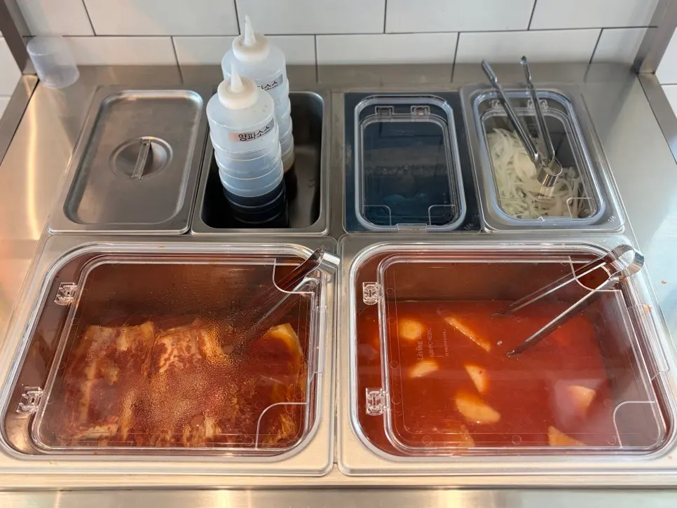 Self-serve side dish bar at Idobonga