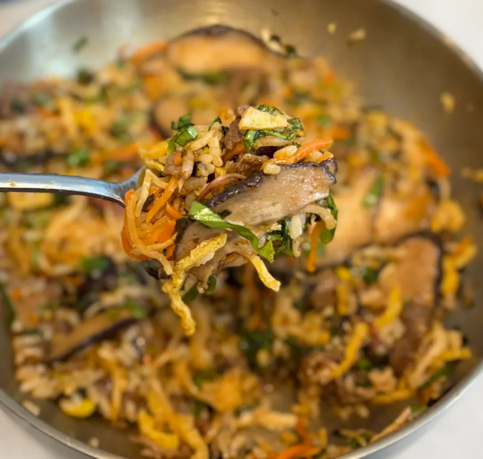 Beef brisket piled in the center of the chadolbak bibimbap