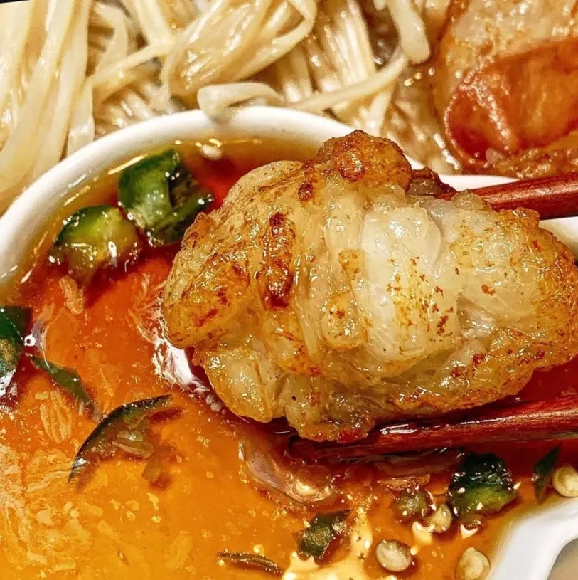Grilled daechang served with sauce containing Cheongyang chili peppers